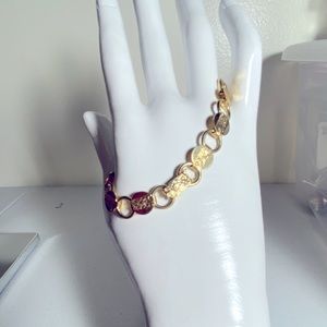 Vintage gold Sarah Coventry engraved bracelet